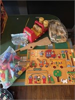 Assorted children’s toys, wooden puzzles