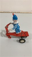 Metal clown on scooter wind up No key, mfg by