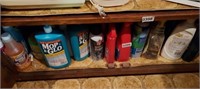 SHELF FULL OF CLEANING SUPPLIES