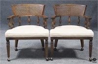 Pair of Rolling Chairs w/Caned Backs