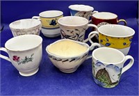 Nine miniature cups