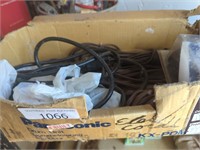 Small box of extension cords and adapters