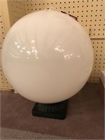 Large white glass pole mounted globe