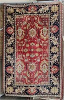 5' 4" x 8' 3" Hand-Knotted Wool Tribal Rug.