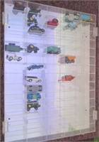 Display case with (19) tractors and Hot Wheel