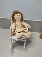 Vintage Rag Doll in white wicker chair