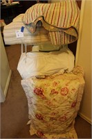 Pillows in shams Drying rack and bedspread