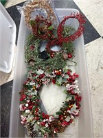 Christmas garland and wreaths in tote
