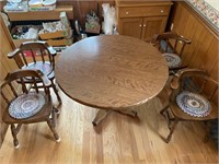 Round pedestal kitchen table with six matching