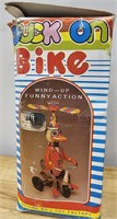 Wind-up funny action Duck on Bike