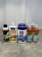 Assortment of Hand Cleaning Products and Water