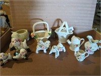 Porcelain dog figurines, pitchers, baskets and