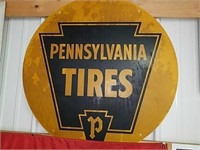 Vintage double-sided Pennsylvania Tires sign.