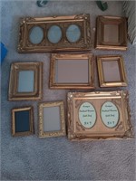 8 gold picture frames.