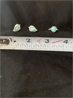 Pair of earrings and a ring