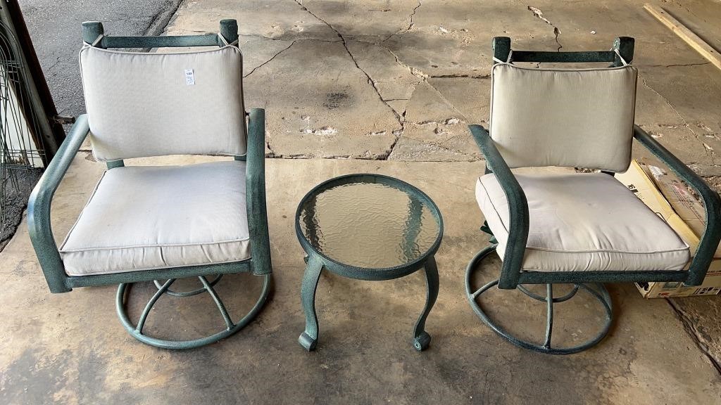 Pair of swivel chairs with covers and glass-top
