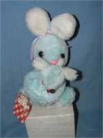 Plush Easter Bunny holding baby toy with original