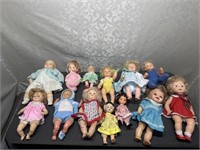 Large assort of rubber and plastic dolls