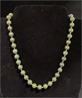 14 KT GOLD CLASP W/ GREEN BEADS