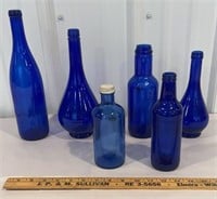 6 blue bottles