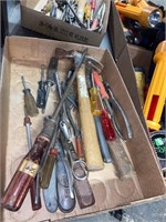 assorted tools including hammer screwdrivers