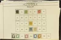Mozambique Stamps Used and Mint hinged on old page