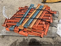 Skid of pallet racking safety arms