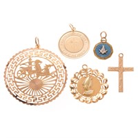 A Collection of Gold Charms and Pendants