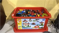Legos, small containers filled with various types