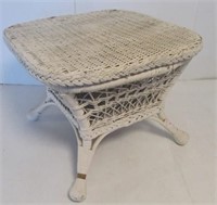 Wicker foot stool with storage under lid.