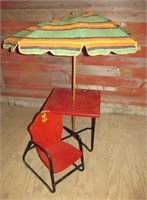 Child size tin table and chair and an old canvas
