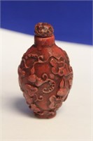 A Carved Resin Snuff Bottle