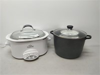 lot of kitchen wear- crock pot, pots, pans, etc.