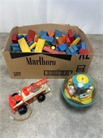 Wood blocks and Fisher Price toys