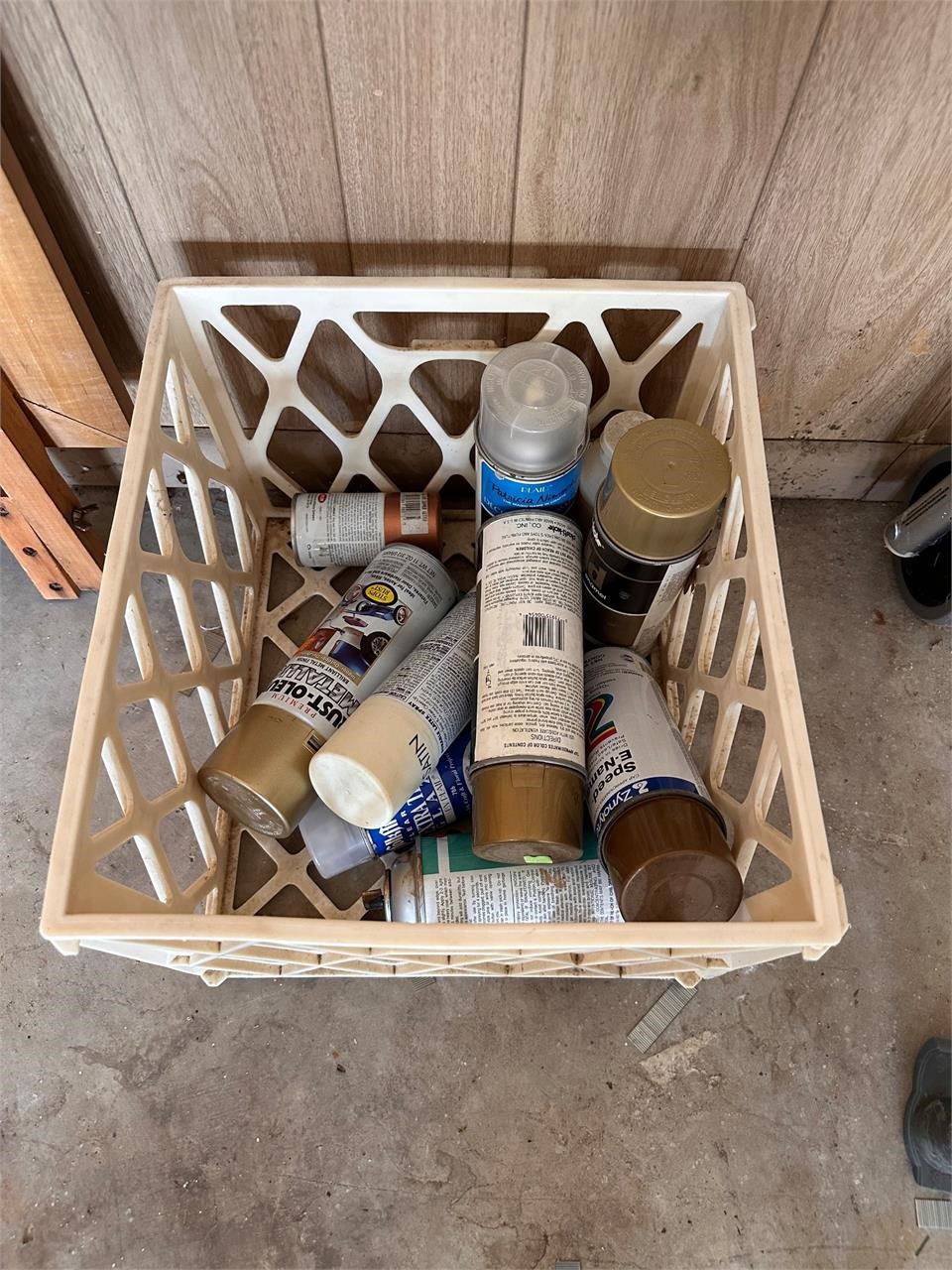 Crate of spray paint