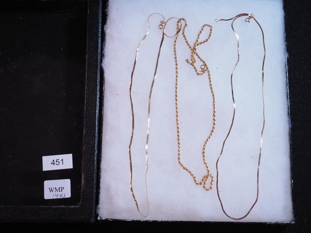 Three 14K yellow gold chains: 20" rope and