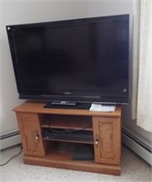 Sony 40" flat screen tv with stand and did/vs.