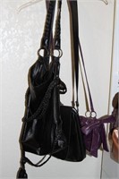 Three leather purses