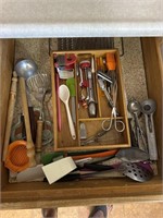Drawer of miscellaneous silverware and utensils