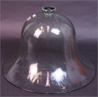 A glass garden cloche to place
