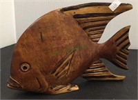 Carved wooden fish measuring 6 inches tall and 9