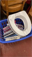 Lot of toilet seat and clothes hangers