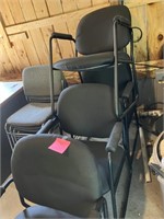 4 black fabric cushioned metal arm chairs