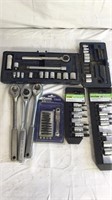 Socket wrenches and bits