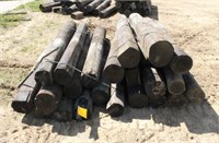 (2) Bundles of Round Wood Posts