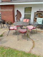 Metal table w/ 4 chairs & cushions