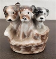 Porcelain Figurine of 3 Puppies in a Basket. Made