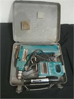 Cordless Makita driver drill with battery and