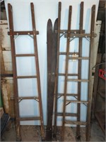 THREE PARTICAL WOODEN LADDERS AND WOODEN SKIS