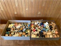 Assorted sewing thread spools